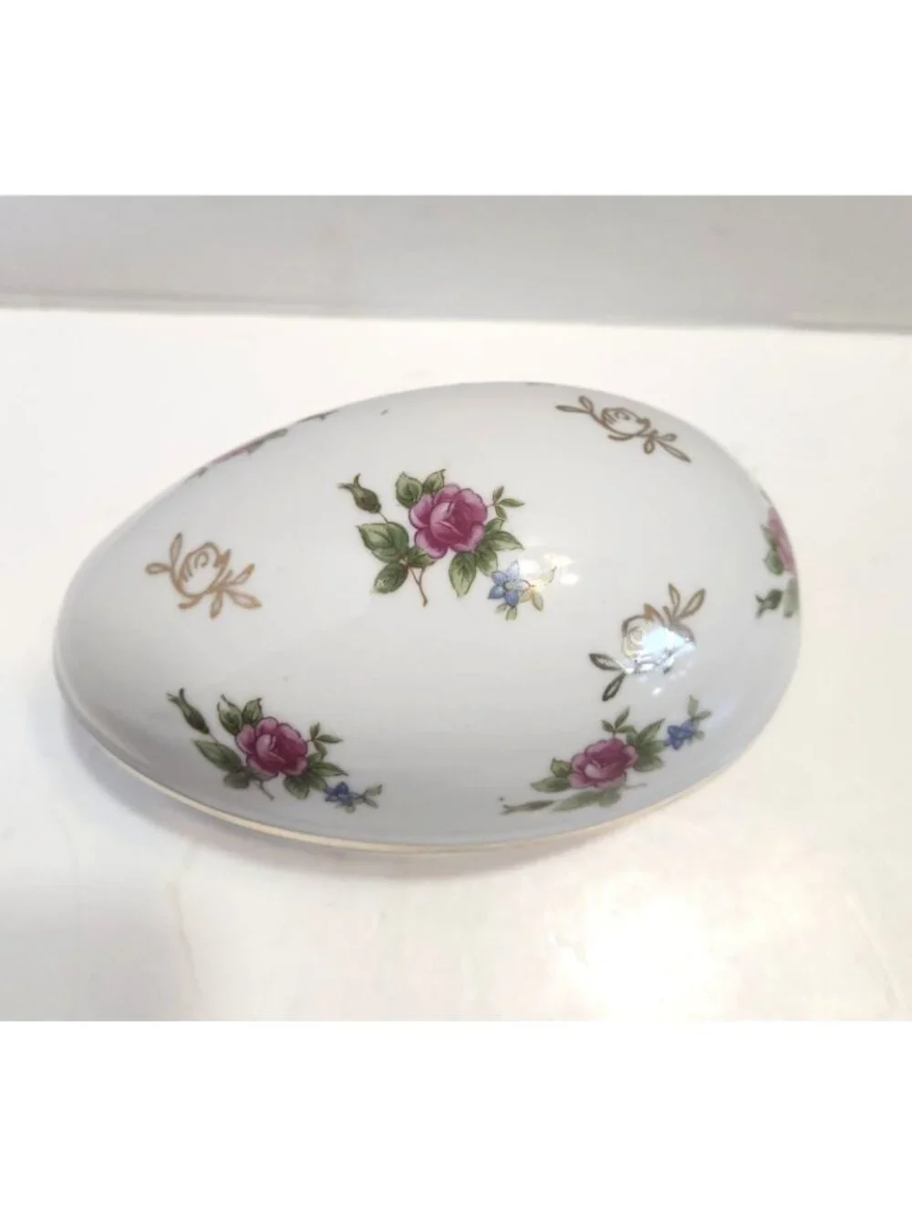 Hand-Painted Porcelain Egg-Shaped Trinket Box With Gold Accents & Floral Design